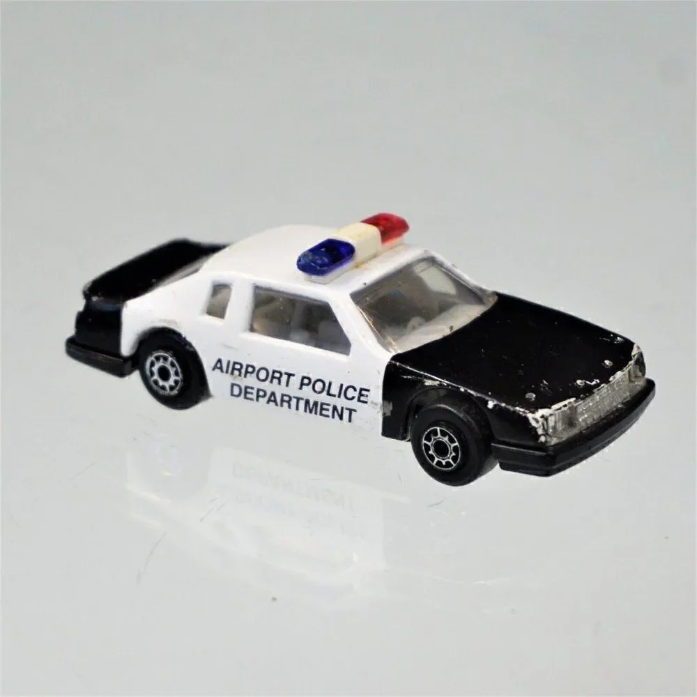 Maisto Buick LeSabre Airport Police Car Diecast Toy 1/64 Scale Black White
